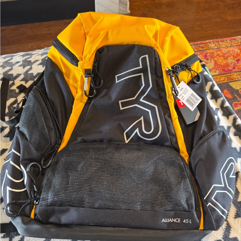 TYR Black and Yellow Sport BP, microfiber sports towel, & Speedo water bottle